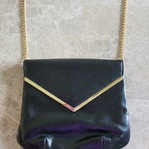Black leather bag, size 9x9 1/2,  straps are 30 1/2, with inner zipper pocket